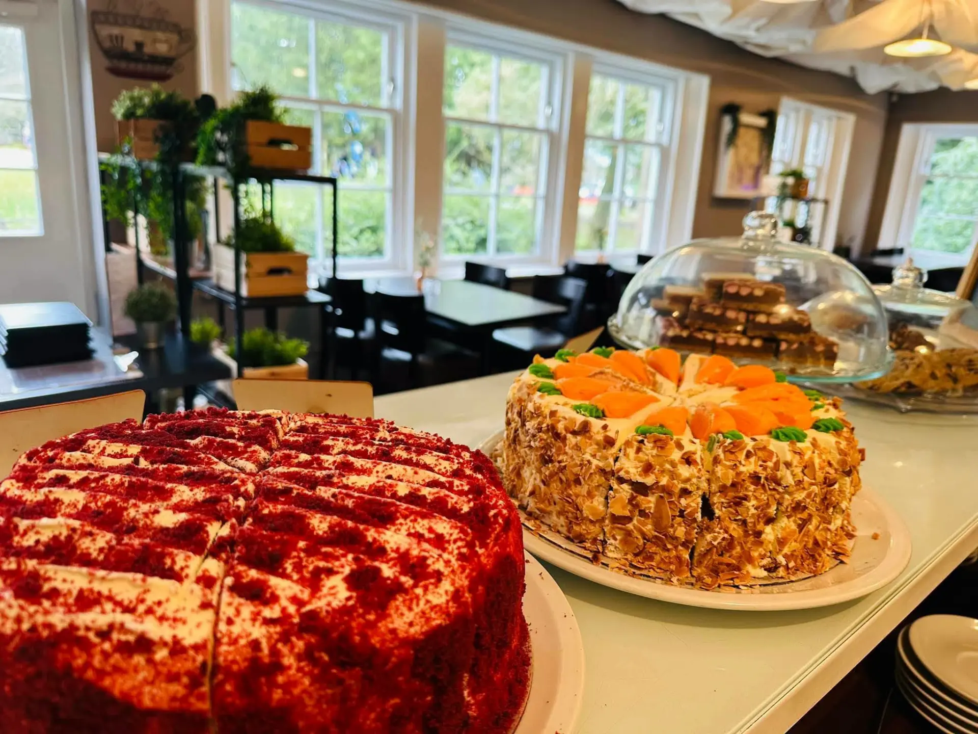 Freshly baked cakes on the counter inside the light-filled Café Byzantium dining room